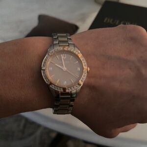 Rose gold and silver Bulova watch with diamond bezel. Hardly worn. Original box